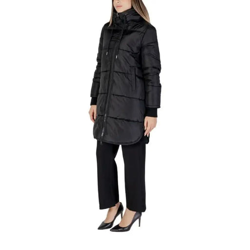 Black quilted winter puffer coat with high collar and zip closure by Cleré