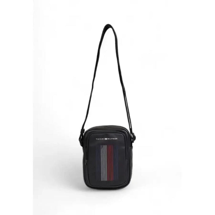 Black Tommy Hilfiger Men Bag featuring vertical striped detail on the front