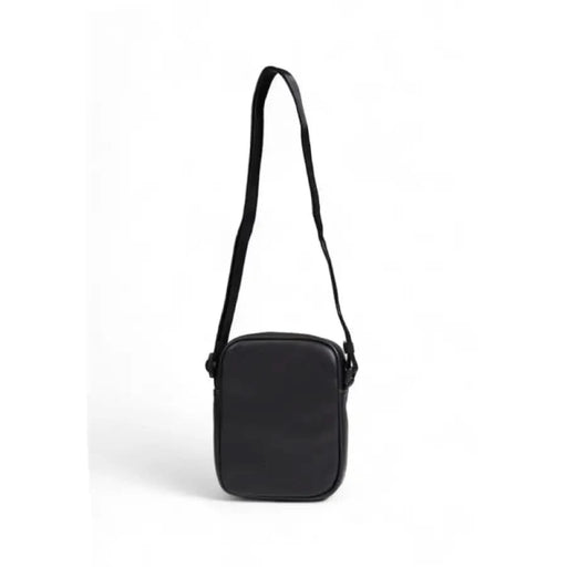 Black rectangular shoulder bag with a single strap by Tommy Hilfiger for men