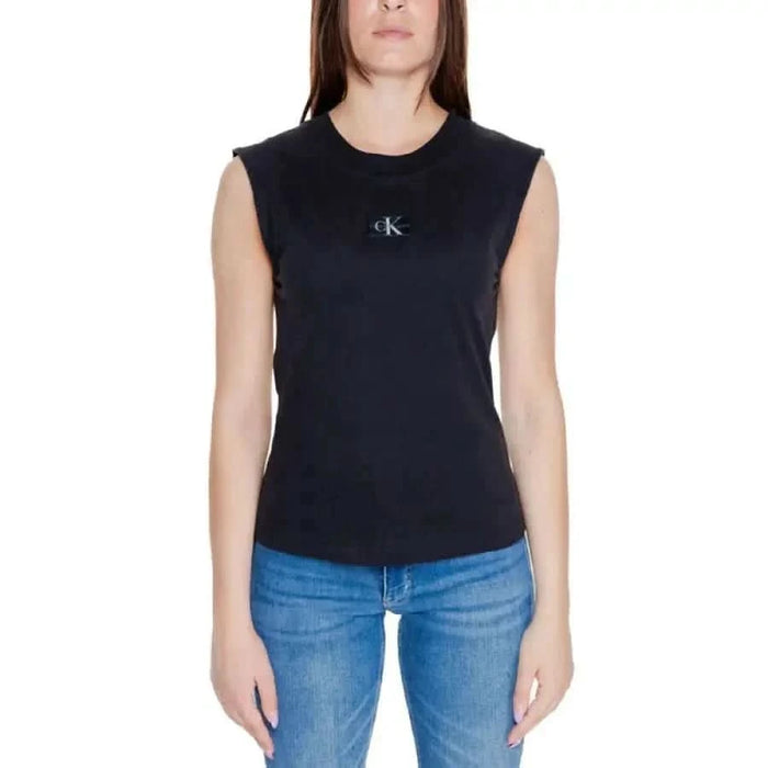 Black ’CK’ top & blue jeans from Calvin Klein Jeans Women’s T-Shirt collection