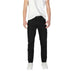 Black straight-leg pants with pockets styled with a white t-shirt and sneakers by Boss