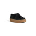 Black suede Clarks women’s lace-up shoe with thick gum rubber platform sole