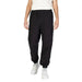 Black Calvin Klein Jeans sweatpants featuring elastic cuffs at the ankles for men