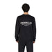 Black cotton sweatshirt for men featuring UNDERCLUB text on the back