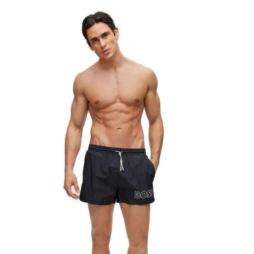 Black swim shorts with drawstring waist and side pockets from Boss Men’s Swimwear