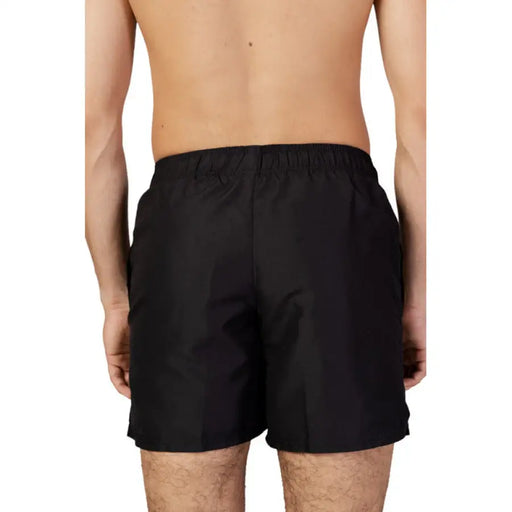 Black Nike Swim men’s polyester swim shorts with elastic waistband and front pockets