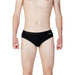 Pale person wearing black Calvin Klein Jeans Men Swimwear briefs