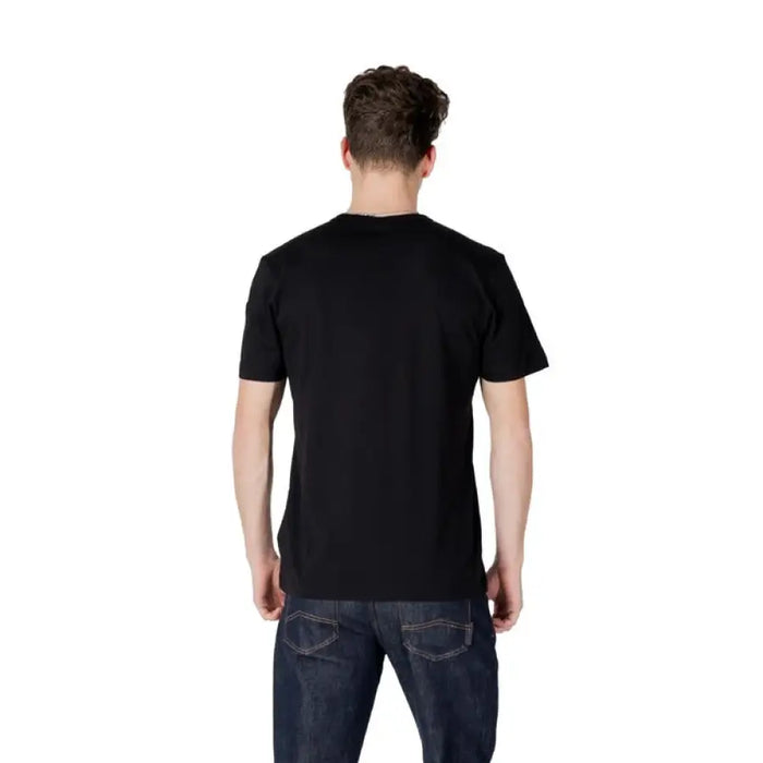 Colmar Originals Men T Shirt in Black Cotton paired with classic blue jeans