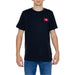 Black T-shirt with small red New Balance logo on chest in New Balance Men T-Shirt collection