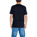 Person wearing a Black Calvin Klein Jeans Men T-Shirt seen from behind