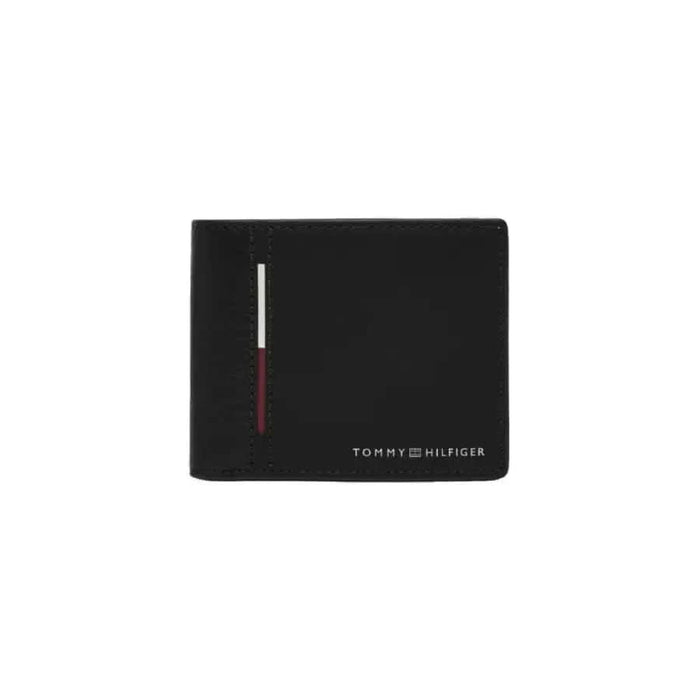 Black Tommy Hilfiger wallet featuring vertical red and white stripe detail