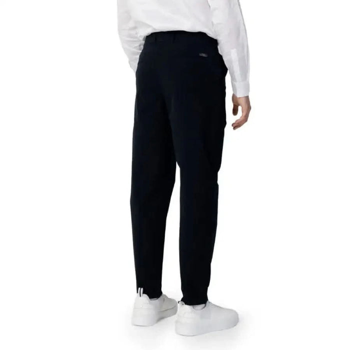 Armani Exchange Men Trousers paired with white sneakers and a white shirt