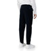 Armani Exchange Men Trousers paired with white sneakers and a white shirt