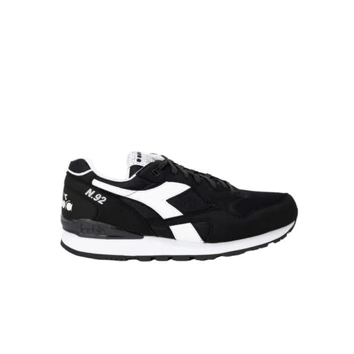 Black and white athletic sneaker with lightning bolt logo by Diadora for men