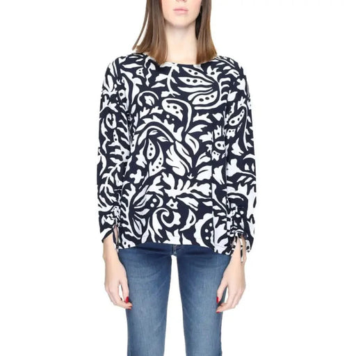 Black and white patterned long-sleeve sweater featuring swirling floral design by Street One