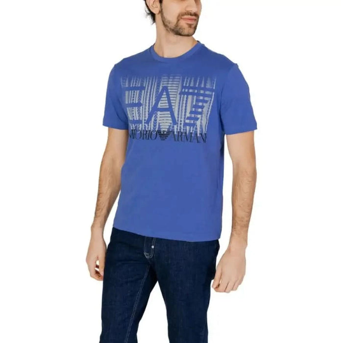 Blue Emporio Armani Ea7 Men T-Shirt with graphic logo print worn by a man