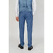 Antony Morato blue suit and trousers with white shirt and black shoes.