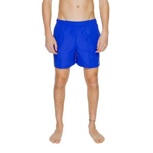 Nike Swim - Bright blue men’s swim shorts or board shorts worn by a model