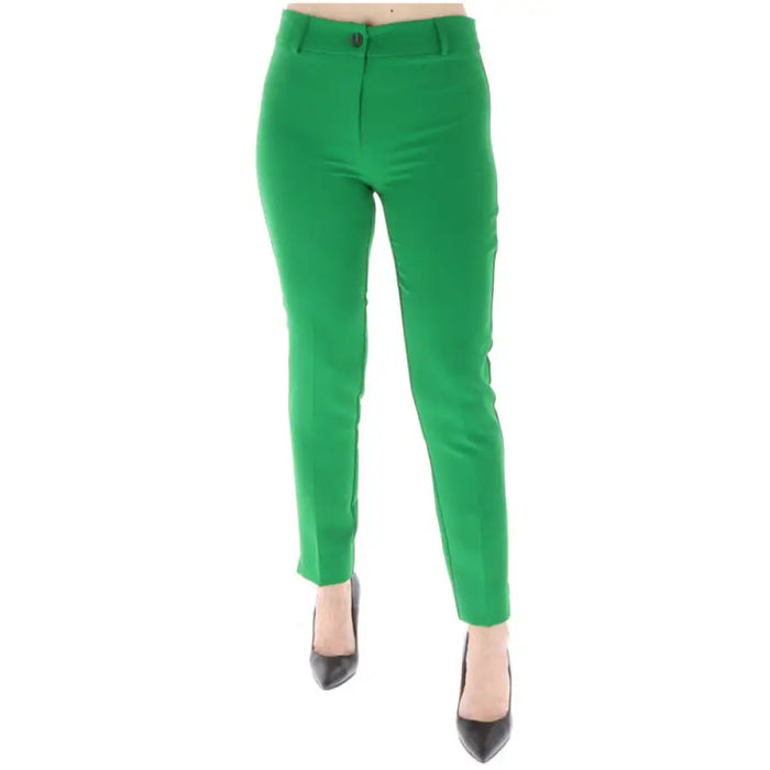 Bright green slim-fit trousers from Sol Wears Women featuring a button closure