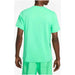 Bright mint green Nike Men T-Shirt worn by person seen from behind