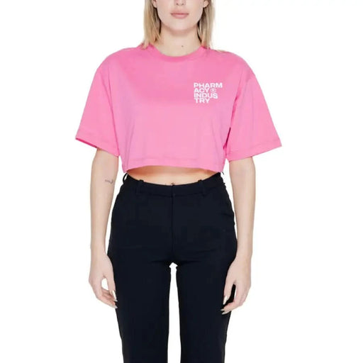 Bright pink cropped t-shirt with ’PHARM ACY INDUS TRY’ text on chest from Pharmacy Women T-Shirt