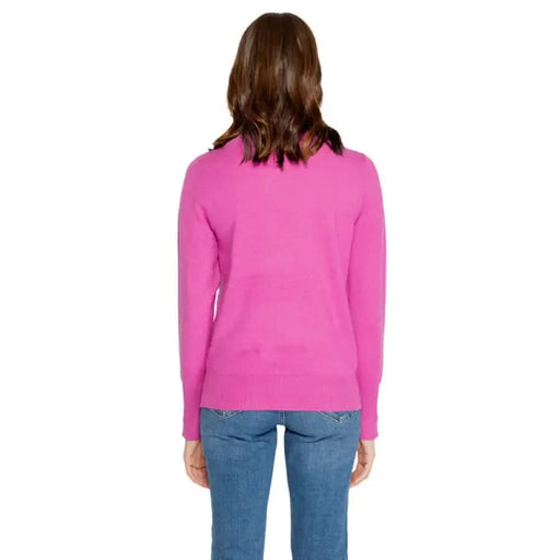 Bright pink long-sleeved sweater worn by a person for Jacqueline De Yong Women Knitwear