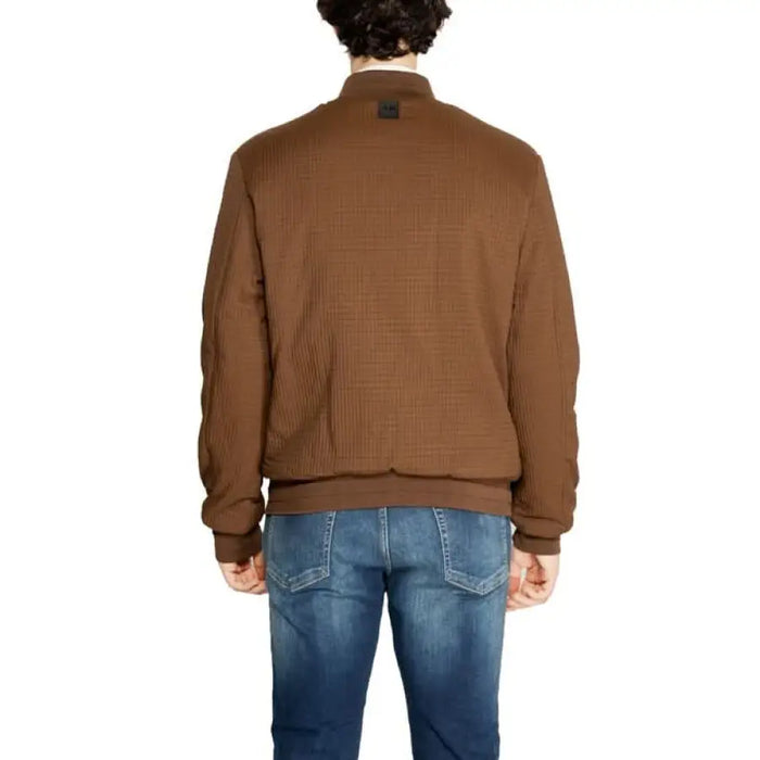 Brown bomber jacket with ribbed trim paired with blue jeans by Antony Morato