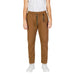 Brown casual pants with drawstring waist paired with white sneakers from Gianni Lupo