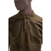 Brown polo shirt featuring two buttons and a small logo patch for Boss Men’s collection