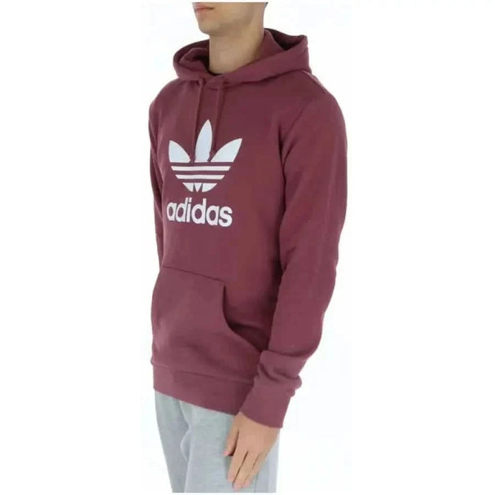 Burgundy Adidas hoodie with white trefoil logo and text on the front in Adidas Men Sweatshirts