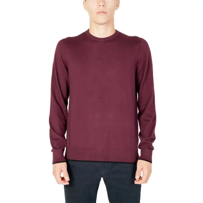 Burgundy crew neck sweater displayed by a model from Armani Exchange Men Knitwear