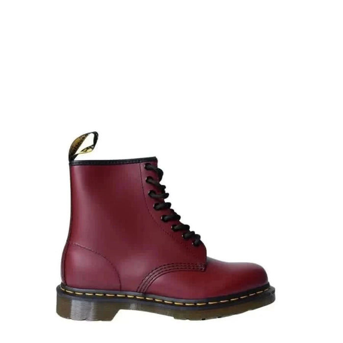 Burgundy leather Dr. Martens combat boot with black laces and yellow stitching