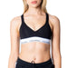 Calvin Klein sports bra with black top and white branded elastic band for women