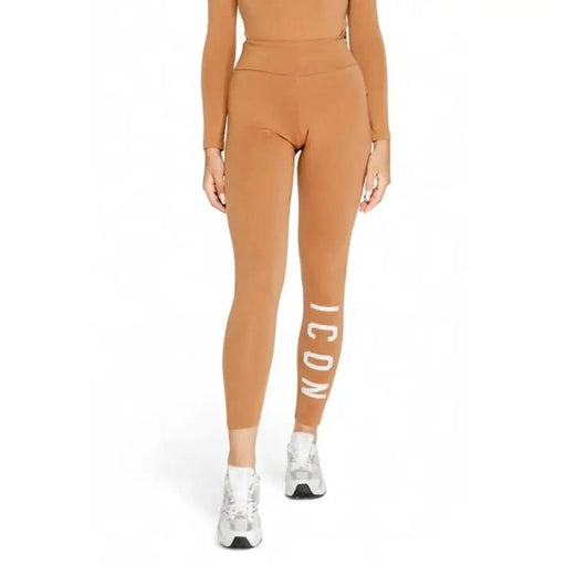 Caramel high-waisted leggings featuring ICON text on leg from Icon Women Trousers collection