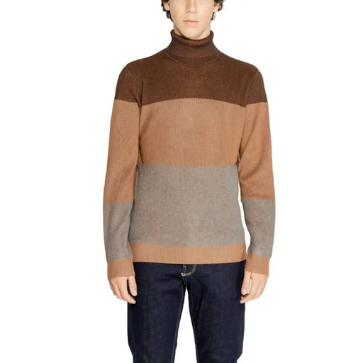 Hamaki-ho Men’s Brown Striped Turtleneck Sweater in color-blocked brown, tan, and gray