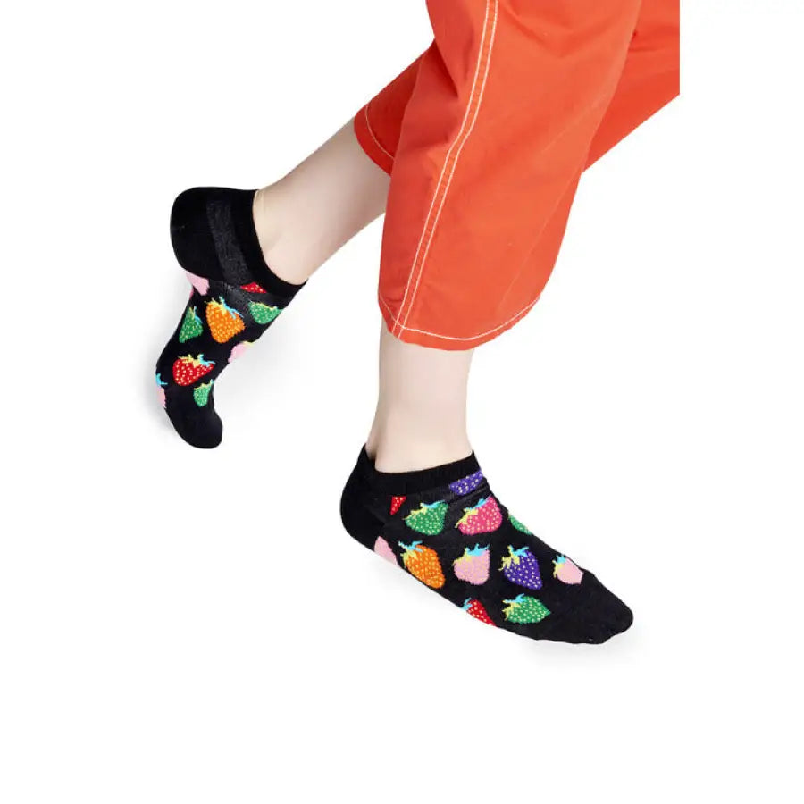 Colorful fruit-patterned ankle socks paired with orange pants, part of Happy Socks Women’s Underwear