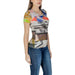 Colorful abstract graphic t-shirt paired with blue jeans, Desigual Women’s style