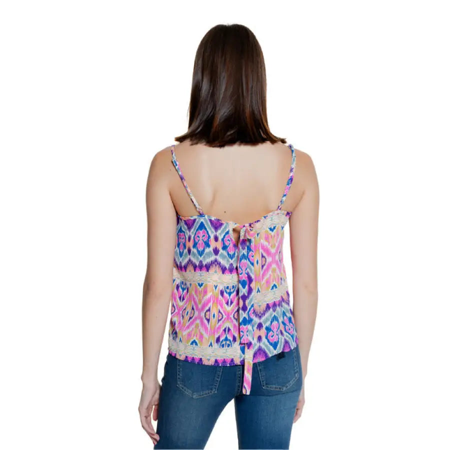 Colorful patterned tank top with thin straps worn by woman facing away - Only Women Undershirt