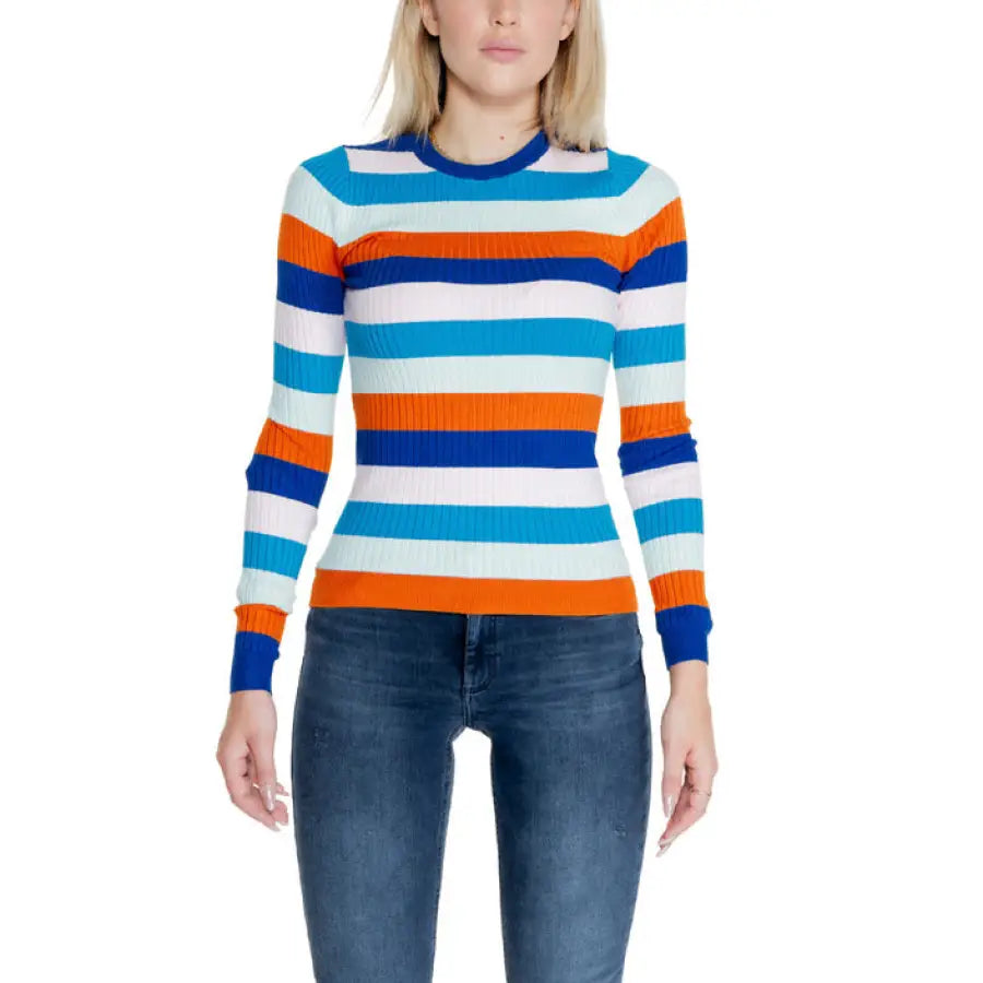 Colorful striped long-sleeved sweater with blue jeans from Only Women Knitwear collection