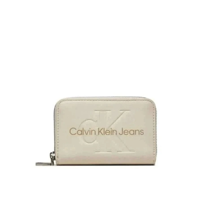 Cream-colored Calvin Klein Jeans wallet with embossed logo and zipper closure for women