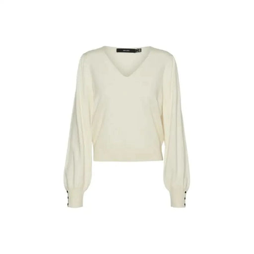 Cream-colored v-neck sweater with puffy long sleeves and button cuffs by Vero Moda