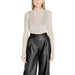 Cream turtleneck top with black leather wide-leg pants for CLERÈ Women’s Tank Top