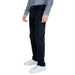 Armani Exchange Men Trousers: Navy straight-leg trousers with white sneakers and light blue shirt