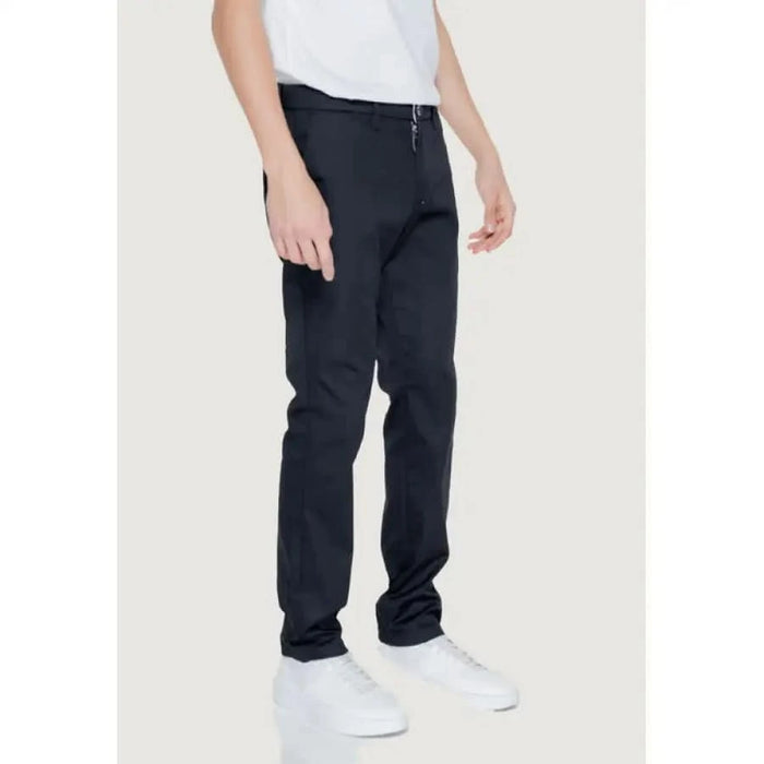 Armani Exchange Men Trousers in dark blue paired with white sneakers