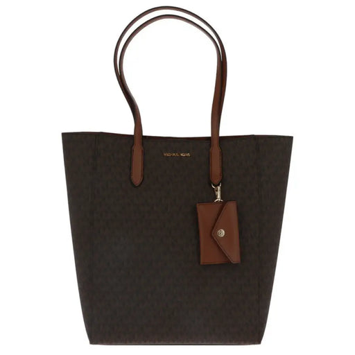 Dark brown Michael Kors tote bag with tan leather handles and card holder