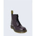 Dr. Martens dark purple leather combat boot with black laces and yellow stitching