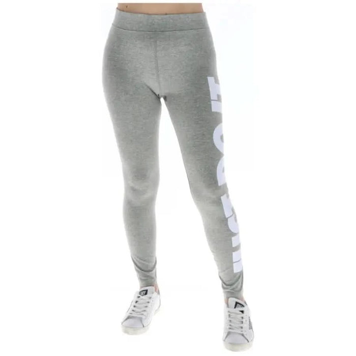 Gray Nike women’s leggings with ’JUST DO IT’ on one leg