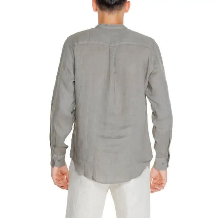 Back view of person wearing gray Borghese-Men long-sleeved shirt, displaying elegant fit