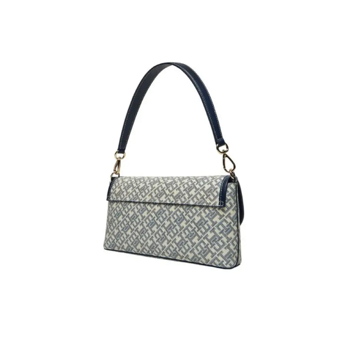 Gray patterned Tommy Hilfiger women’s bag with black leather strap and silver hardware