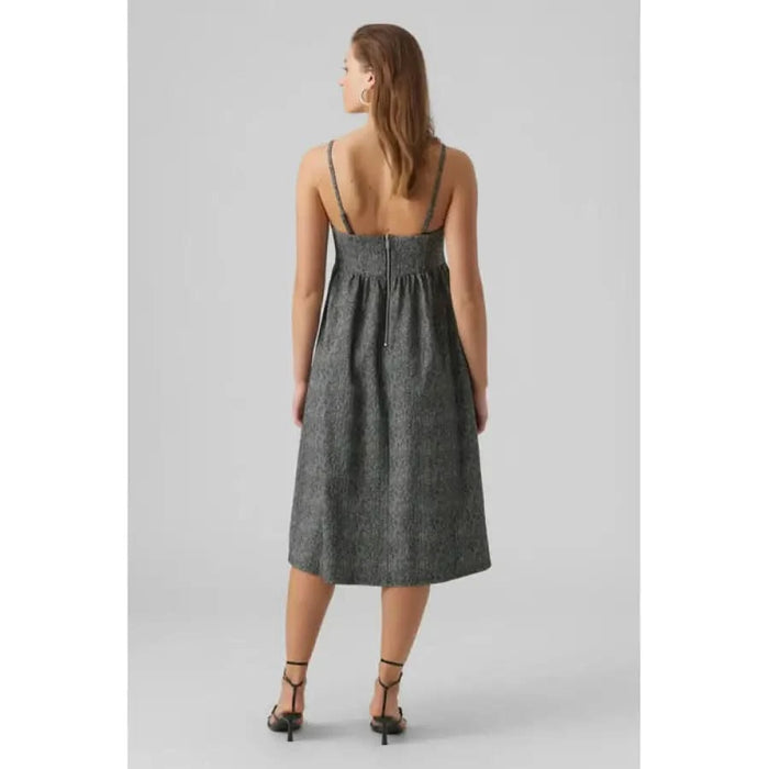 Gray sleeveless midi dress with thin straps and an empire waist, back view - Aware Women Dress